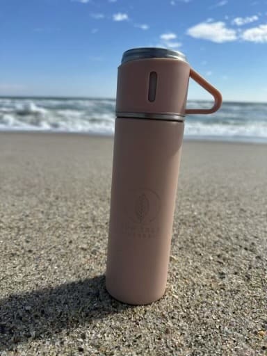 A thermos can keep your tea hot or ice cold for hours while you travel!