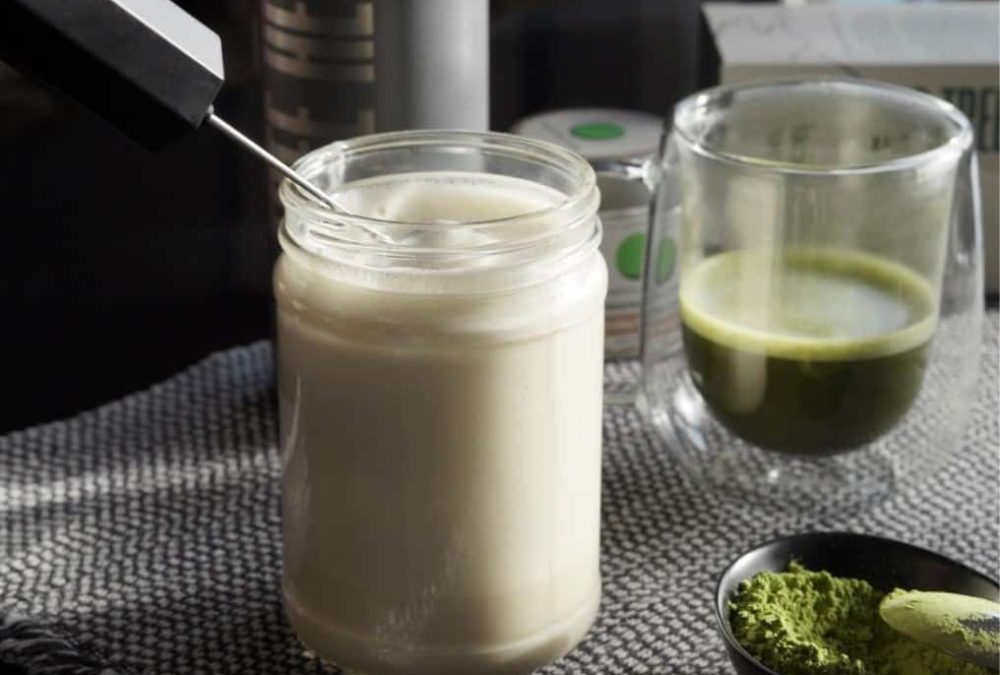 Frothing milk for an easy kratom matcha latte to support energy and focus